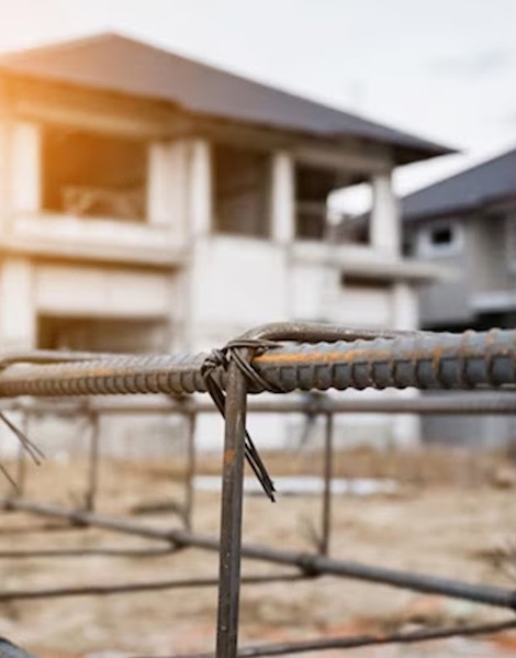 TMT steel rebars tied at a construction site foundation