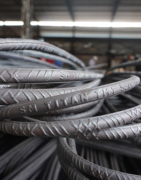 SM Titan TMT 550D steel bars with ribbed pattern